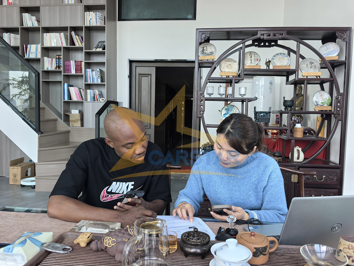 A customer from Ghana visited and purchased two used toyota coaster.