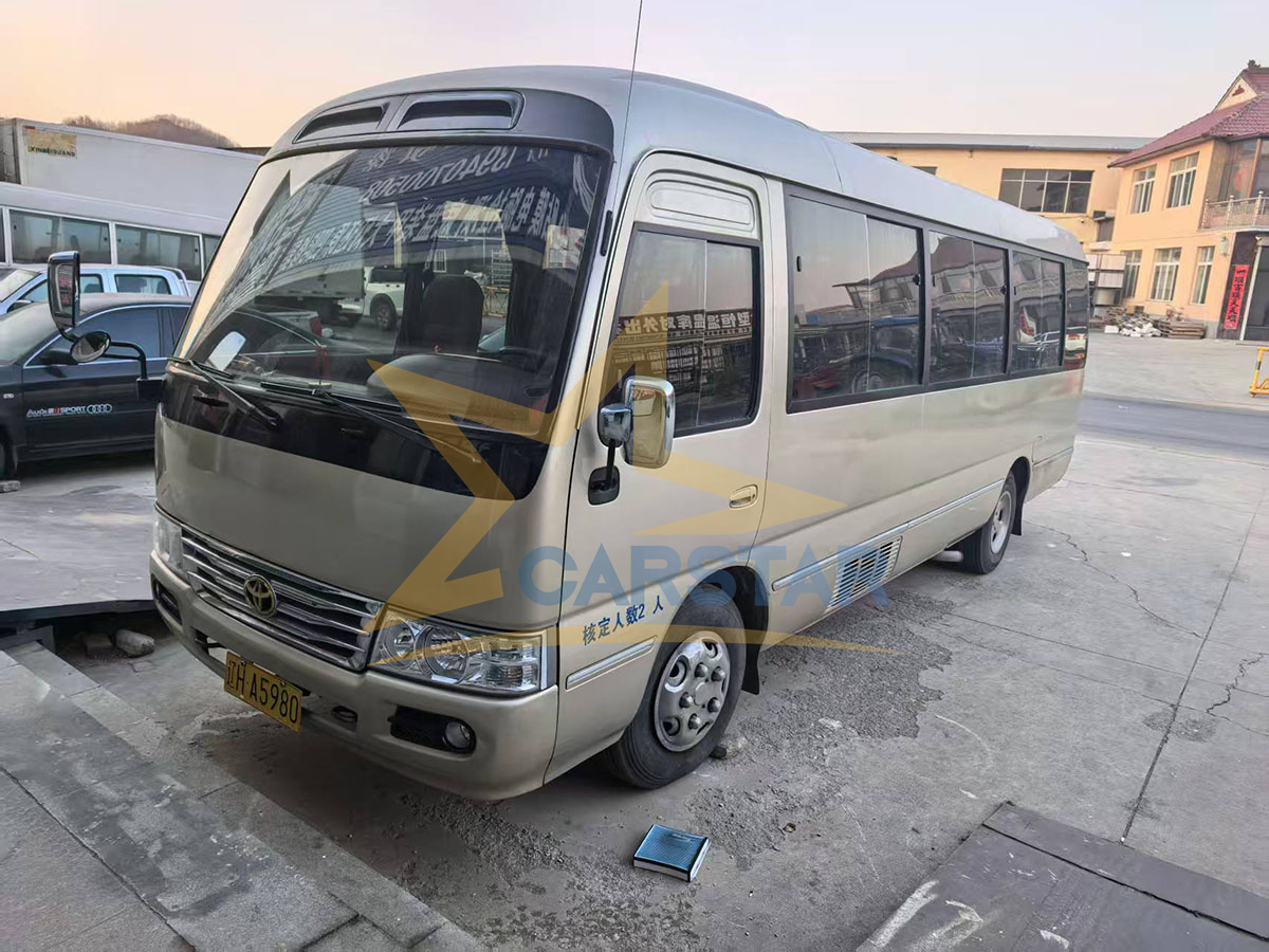 Used Coaster bus have arrived at the company depot. 